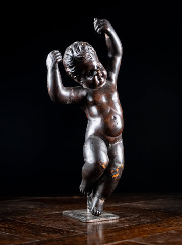 19th Century Ebonised Carved Putto - Harrington Antiques