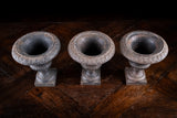 Three Miniature Cast Iron Urns