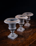 Three Miniature Cast Iron Urns