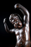 19th Century Ebonised Carved Putto