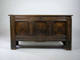 17th Century Oak Plank Coffer With Carved Triple Panel Front. - Harrington Antiques