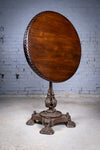 19th Century Cast Iron Tilt Table With Later Flame Mahogany Top. - Harrington Antiques