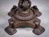 19th Century Cast Iron Tilt Table With Later Flame Mahogany Top. - Harrington Antiques