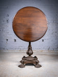 19th Century Cast Iron Tilt Table With Later Flame Mahogany Top. - Harrington Antiques