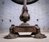 19th Century Cast Iron Tilt Table With Later Flame Mahogany Top. - Harrington Antiques