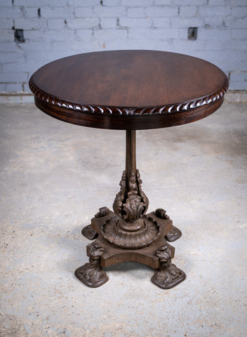 19th Century Cast Iron Tilt Table With Later Flame Mahogany Top. - Harrington Antiques