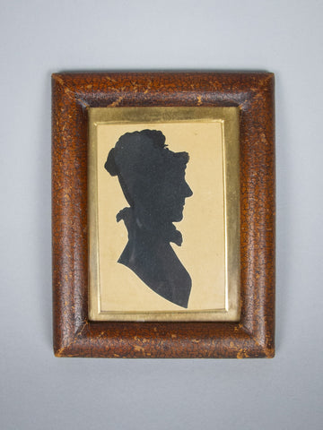 19th Century Hand Painted Silhouette Of A Woman In Leather Frame - Harrington Antiques