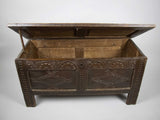 Antique 17th Century Carved Oak Coffer With Raised Legs & Original Iron Loop Hinges. - Harrington Antiques