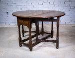 Early 18th Century English Oak Gate Leg Table With Central Drawer. - Harrington Antiques