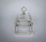 George V Sterling Silver 7 Bar Toast Rack by Adie Brothers, Birmingham, 1926 - Harrington Antiques