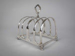 George V Sterling Silver Toast Rack by Walker & Hall, Birmingham, 1927. - Harrington Antiques