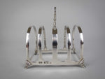 George V Sterling Silver Toast Rack by Walker & Hall, Birmingham, 1927. - Harrington Antiques