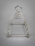 George V Sterling Silver Toast Rack by Walker & Hall, Birmingham, 1927. - Harrington Antiques