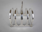 George V Sterling Silver Toast Rack by Walker & Hall, Birmingham, 1927. - Harrington Antiques