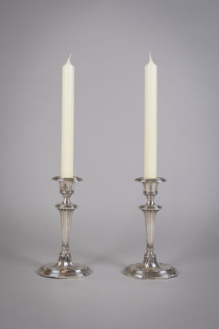 Pair Of Sterling Silver Neoclassical Candlesticks by Charles Boyton & Sons, 1911. - Harrington Antiques