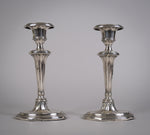 Pair Of Sterling Silver Neoclassical Candlesticks by Charles Boyton & Sons, 1911. - Harrington Antiques