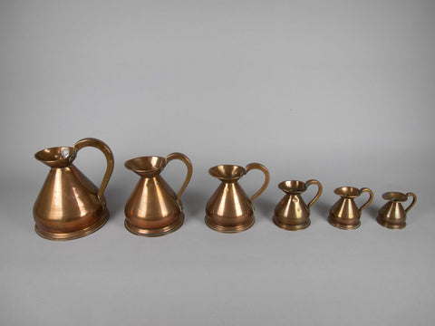 Six Graduated Vintage Copper Imperial Measuring Jugs. - Harrington Antiques