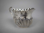 Small Sterling Silver Milk Jug by John Millward Banks, Chester, 1899. - Harrington Antiques