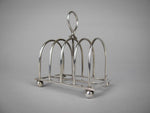 Sterling Silver Five Bar Toast Rack by William Hutton & Sons, Sheffield, 1907. - Harrington Antiques