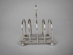 Sterling Silver Five Bar Toast Rack by William Hutton & Sons, Sheffield, 1907. - Harrington Antiques