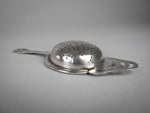 Sterling Silver Tea Strainer by Angora Silver Plate Co, Birmingham, 1932. - Harrington Antiques