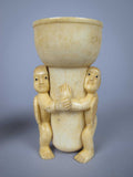 Unusual Pair of 19th Century Carved Bone Cherub Candle Holders. - Harrington Antiques