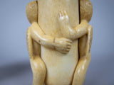 Unusual Pair of 19th Century Carved Bone Cherub Candle Holders. - Harrington Antiques
