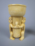 Unusual Pair of 19th Century Carved Bone Cherub Candle Holders. - Harrington Antiques