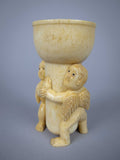 Unusual Pair of 19th Century Carved Bone Cherub Candle Holders. - Harrington Antiques